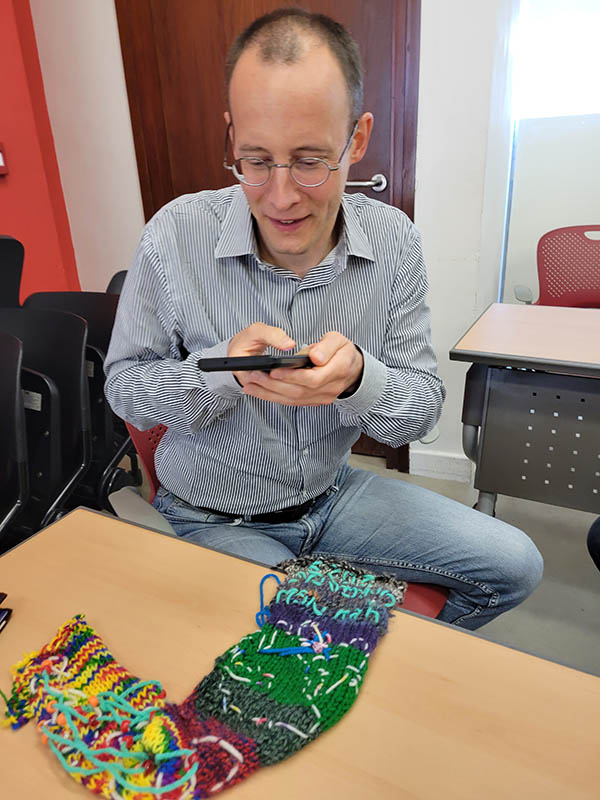 A participant with a complex path captured in textiles