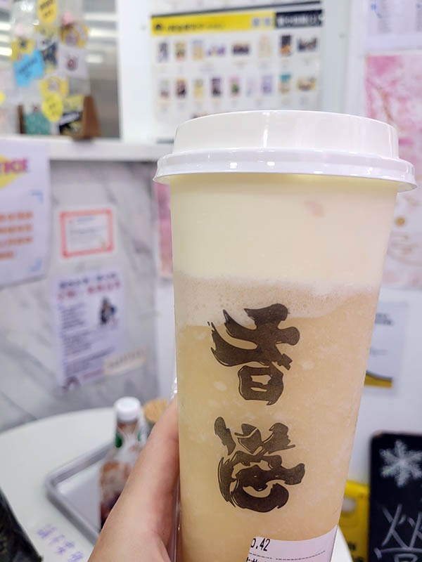 Lychee with cheese foam boba in a cup