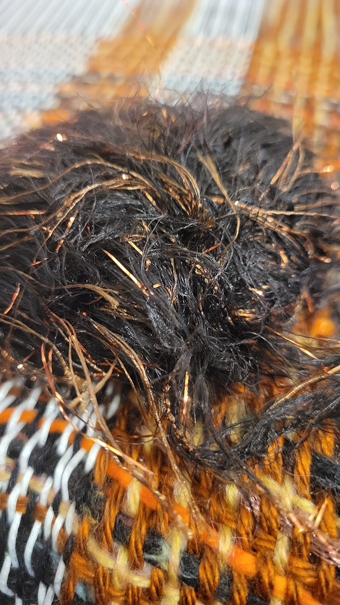 Fluffy black and bronze yarn