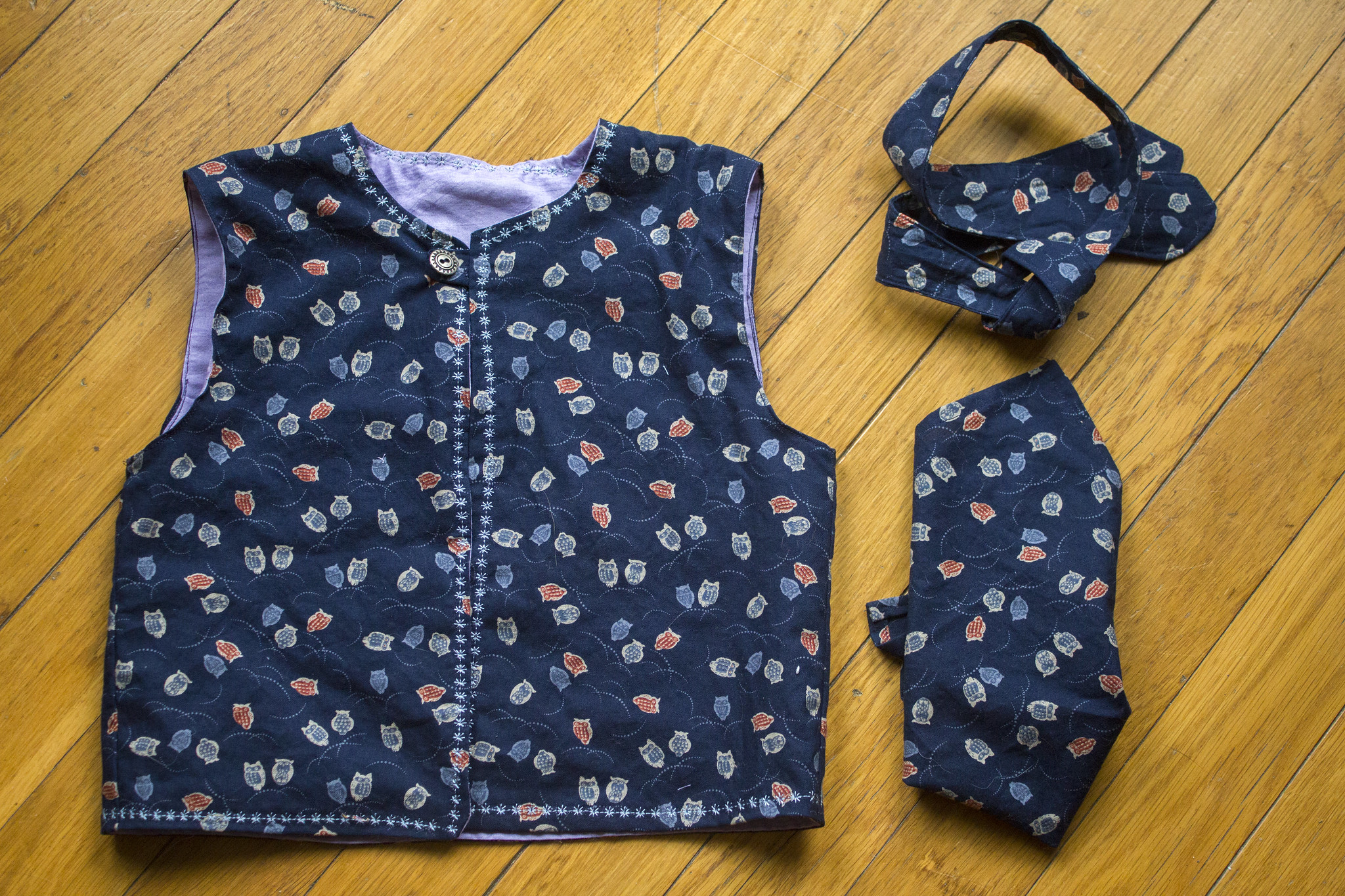 Vest, bowtie, handkerchief